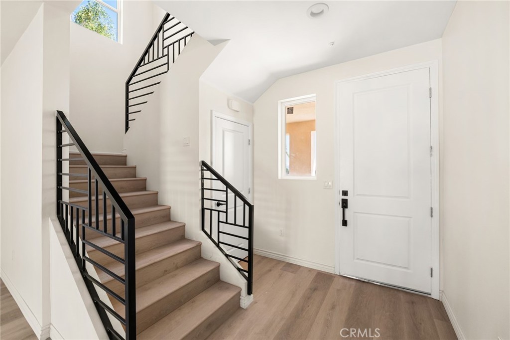 3260 Howe Street Corona, CA 92881 - Photo 10 of 28 a view of entryway with wooden floor