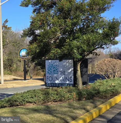a front view of a building with garden