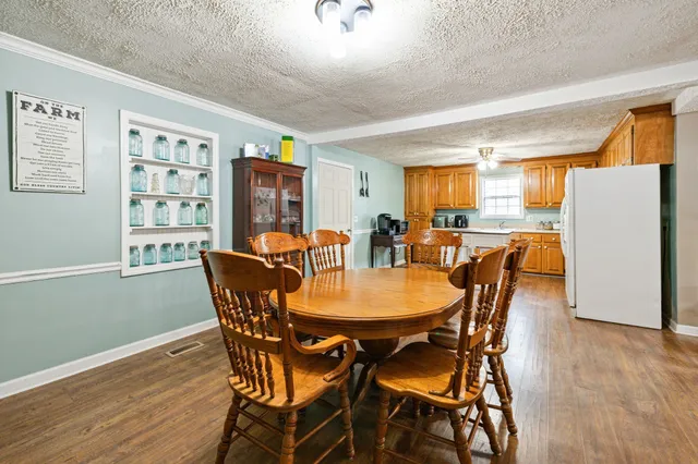 a bedroom with a bed and dresser