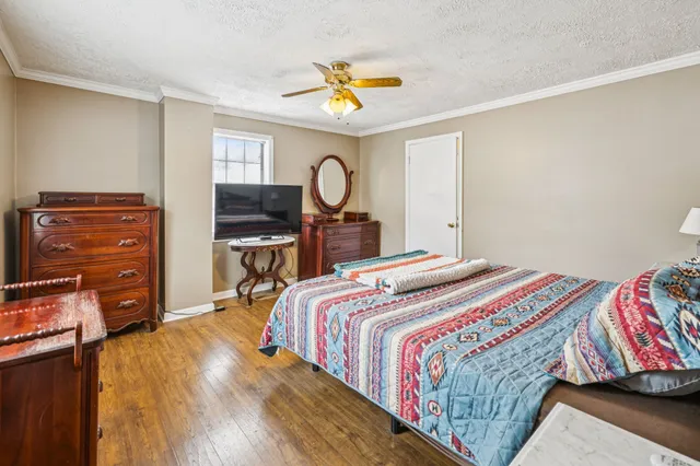 a bathroom with a sink mirror toilet and bathtub