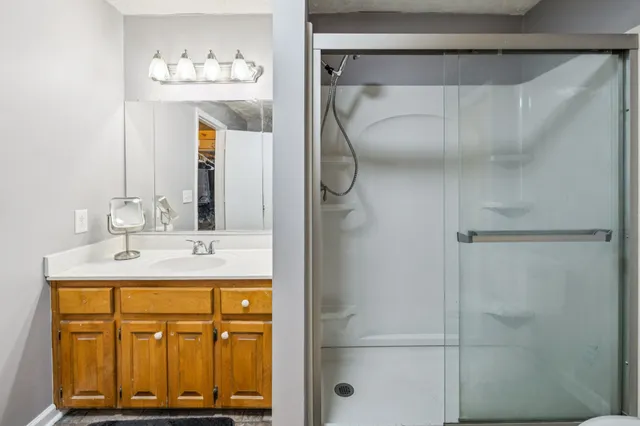 a view of a two chairs in the patio