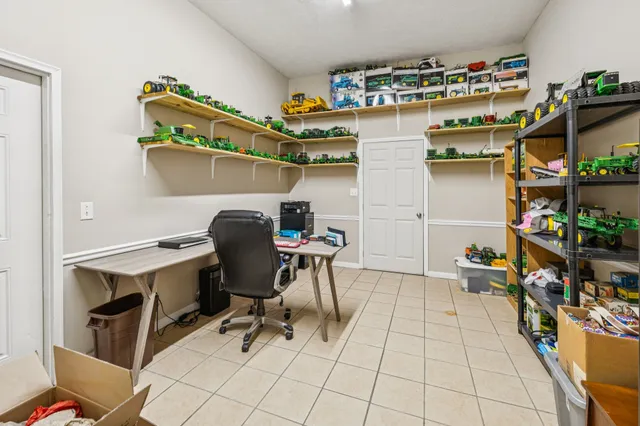 a view of a big yard with lots of green space and mountain view