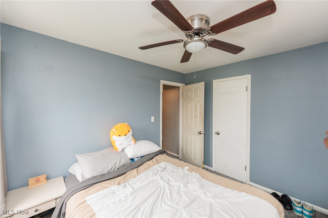 3443 Dentzler Road Parma, OH 44134 - Photo 19 of 48 Bedroom featuring baseboards and ceiling fan