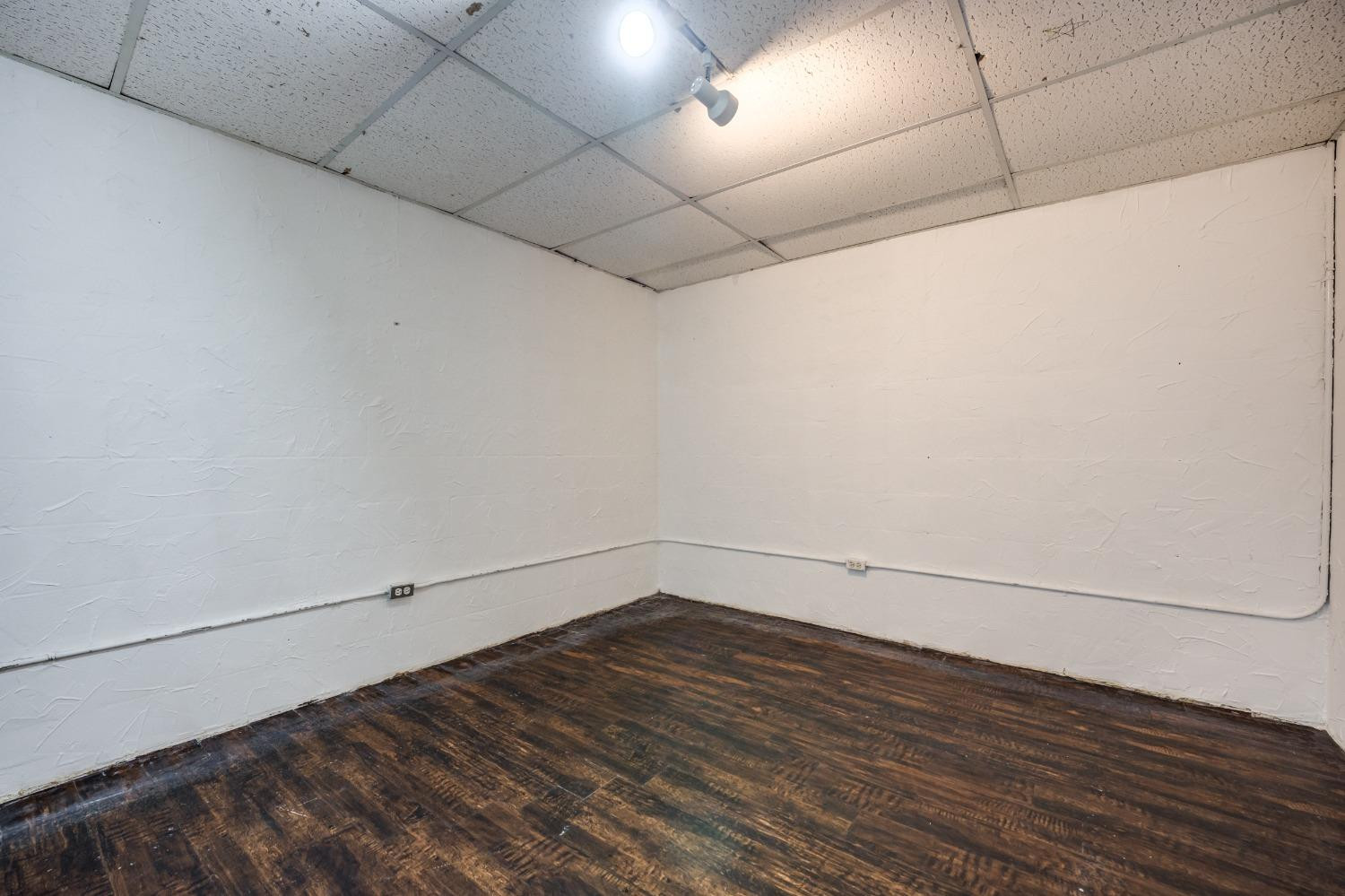2314 79th Street Lubbock, TX 79423 - Photo 27 of 33 a view of a room with wooden floor