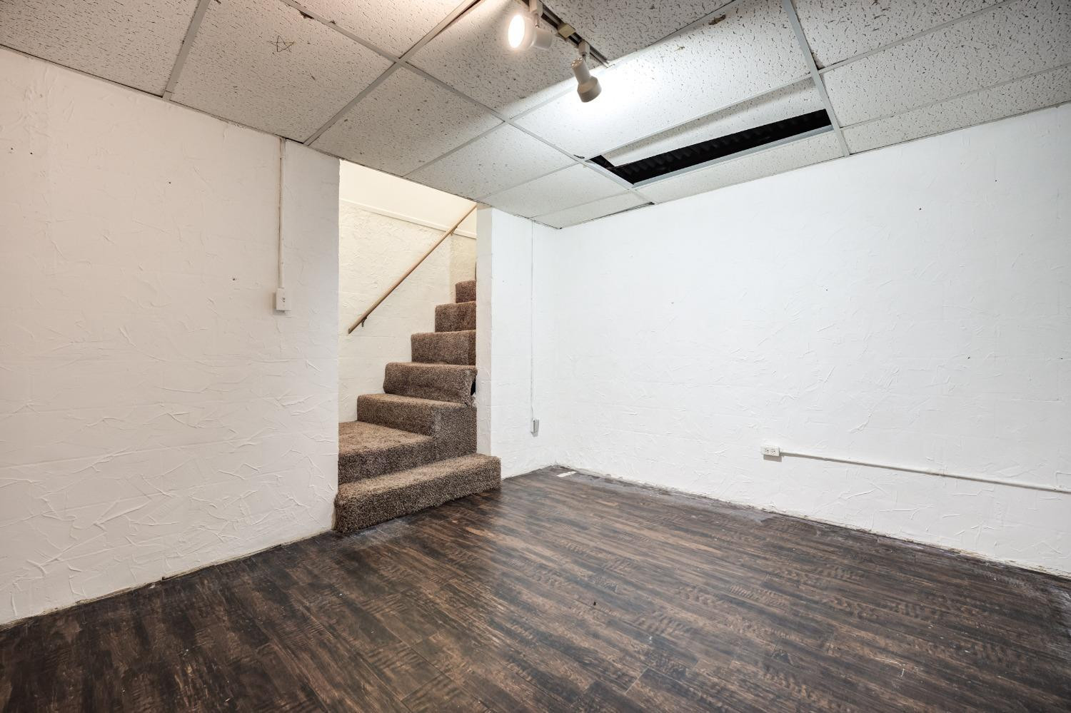2314 79th Street Lubbock, TX 79423 - Photo 28 of 33 a view of an entryway with wooden floor
