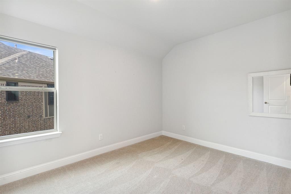 18142 Lakefront Court Forney, TX 75126 - Photo 17 of 26 an empty room with a window