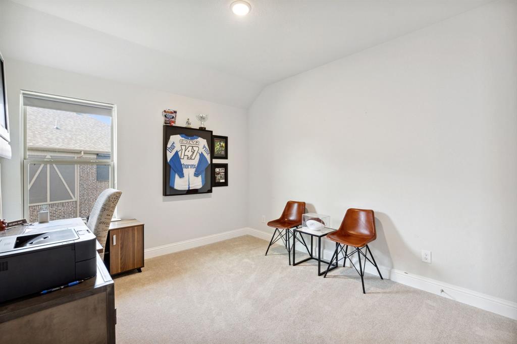 18142 Lakefront Court Forney, TX 75126 - Photo 18 of 26 a workspace with furniture and a window