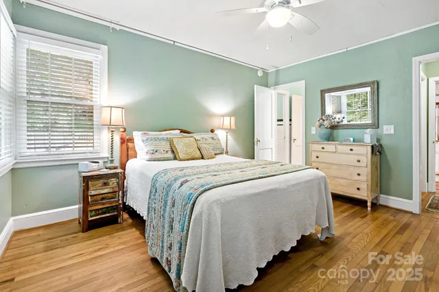 a en suite bathroom with a sink and a mirror