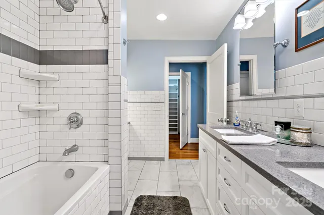a living room with furniture cabinets and window