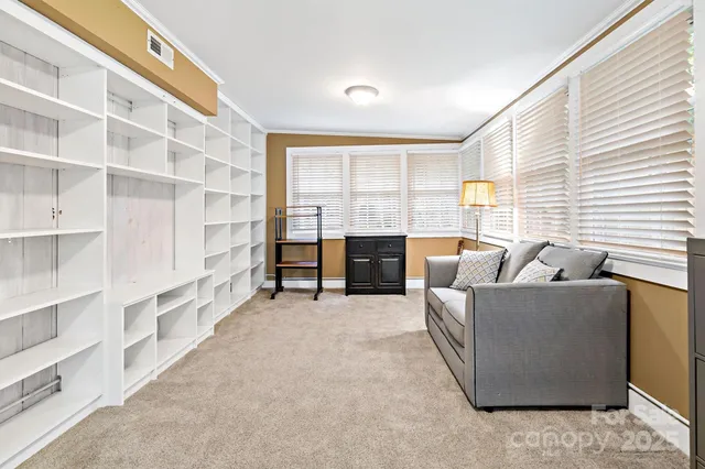 a view of a room with rack on the wall