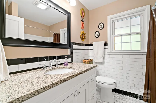 an aerial view of a house with outdoor space