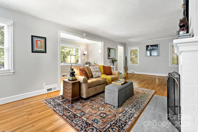 a kitchen with a stove a sink and a refrigerator