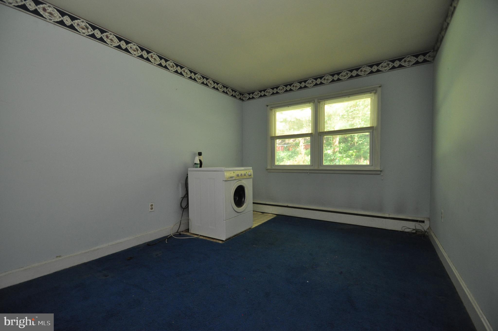 1431 Ridge Road Westminster, MD 21157 - Photo 9 of 23 Bedroom had been used as main level laundry