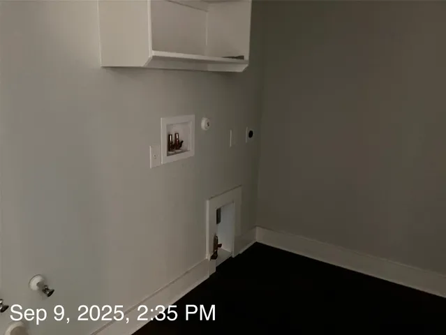 a room with a fireplace and a fireplace