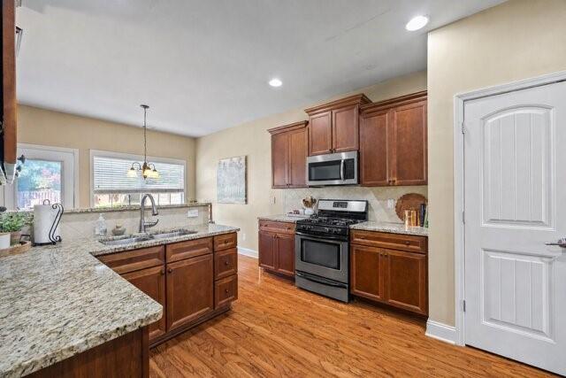 42 Pintail Lane Jefferson, GA 30549 - Photo 6 of 42 a kitchen with stainless steel appliances granite countertop a sink stove and refrigerator
