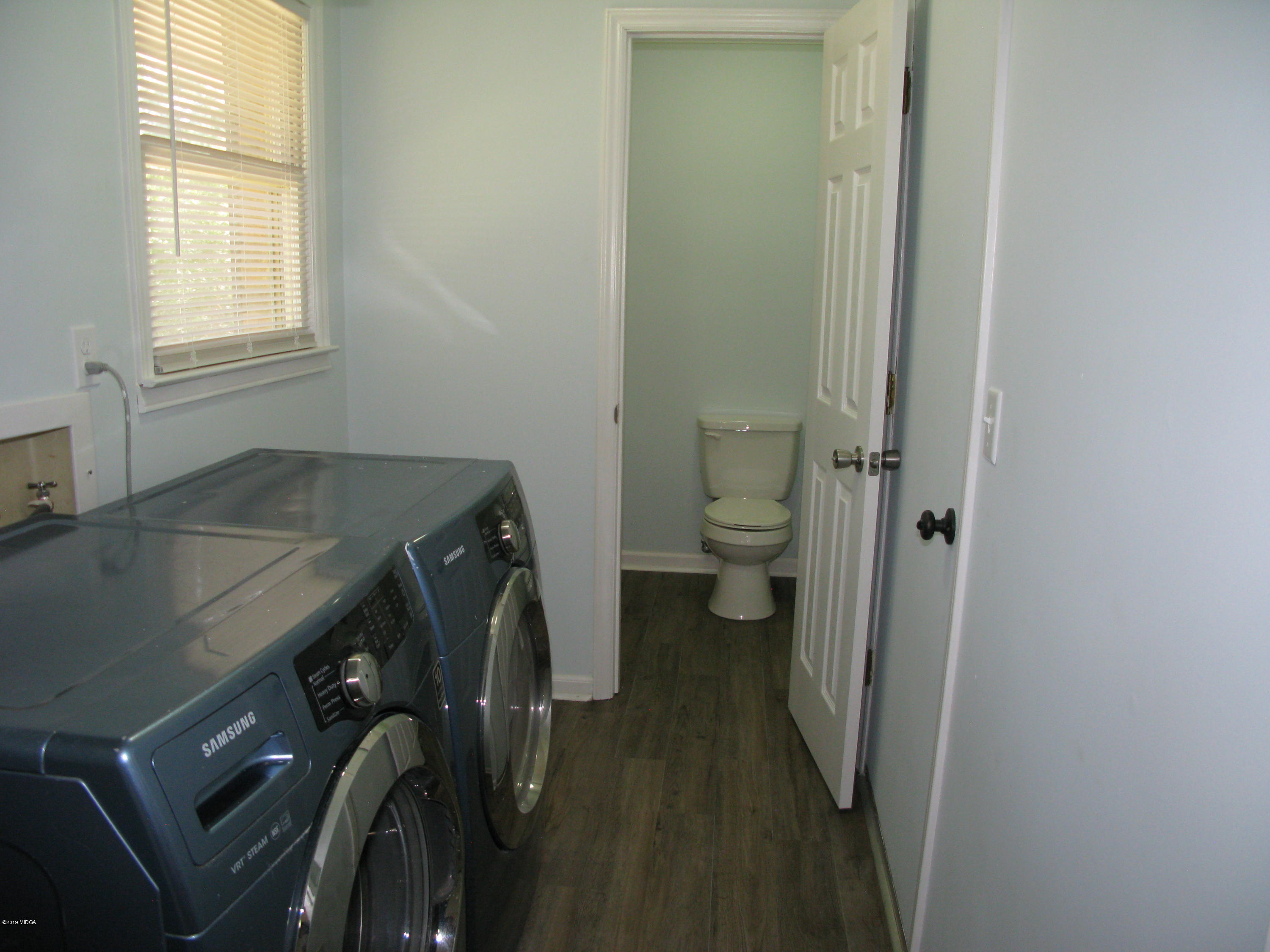 3812 Western Way Macon, GA 31216 - Photo 13 of 29 a bathroom with a sink and a toilet