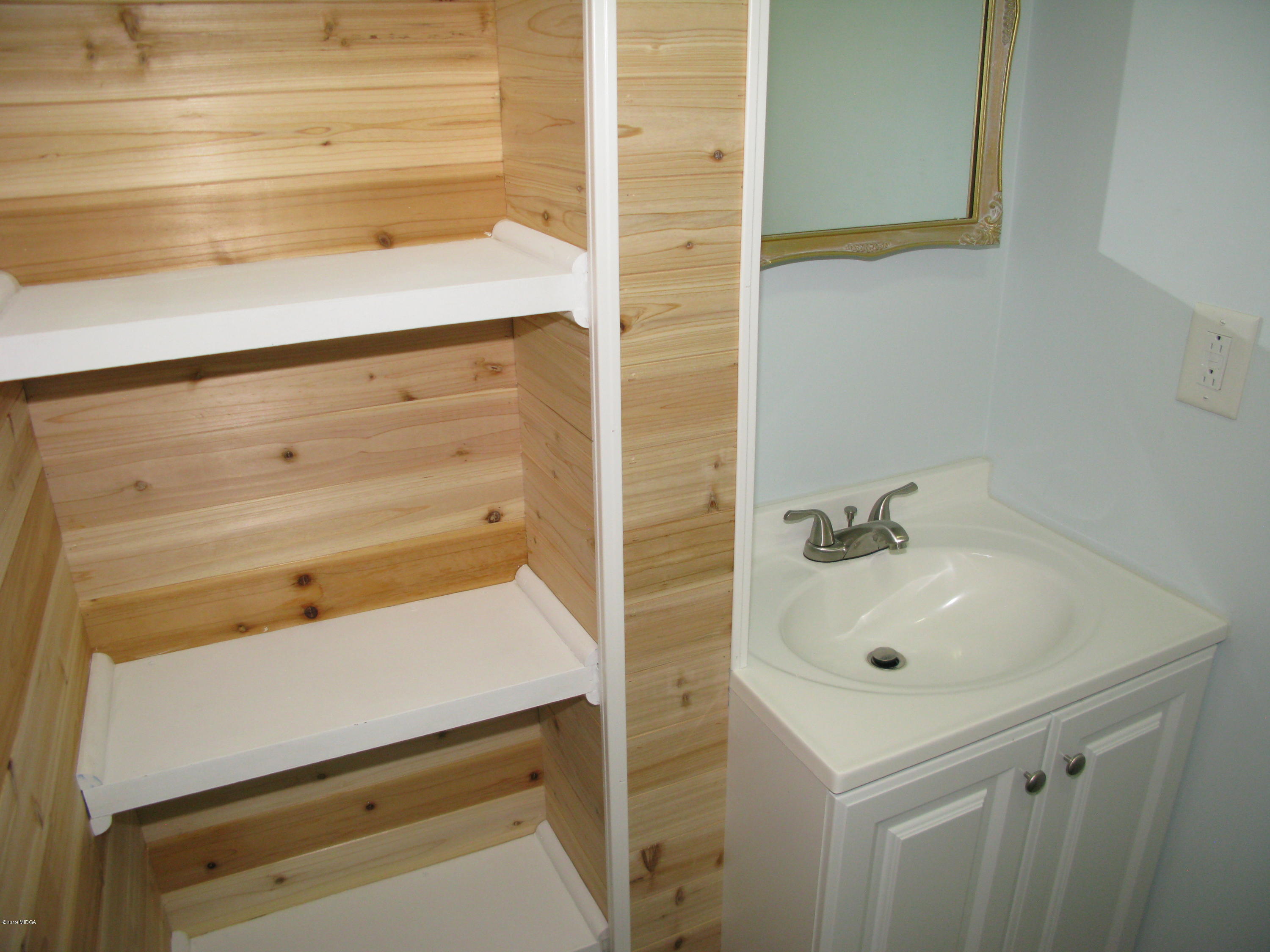 3812 Western Way Macon, GA 31216 - Photo 14 of 29 a bathroom with a sink and a toilet