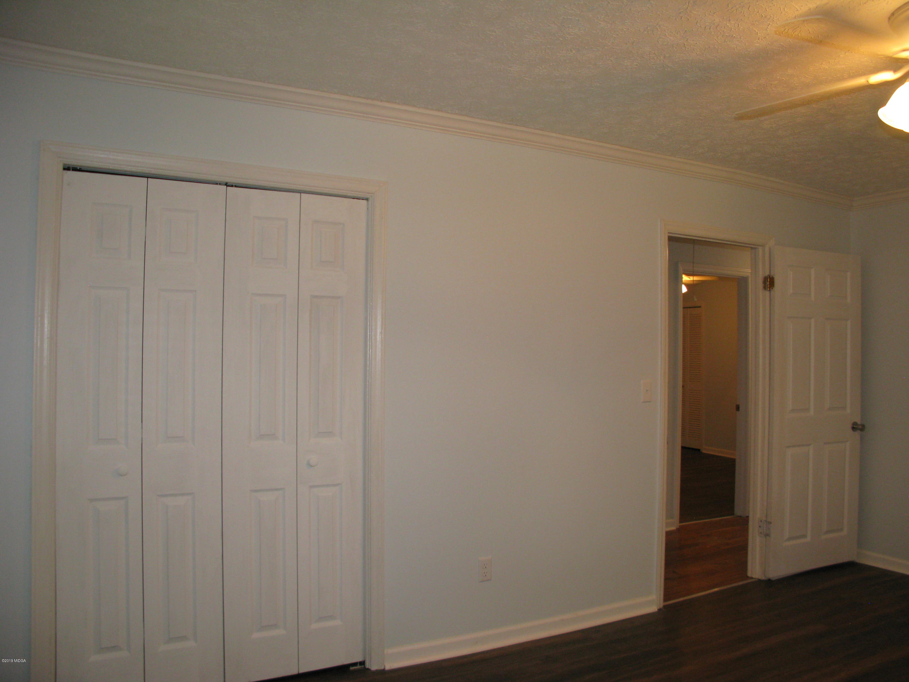 3812 Western Way Macon, GA 31216 - Photo 16 of 29 a view of a livingroom with wooden floor