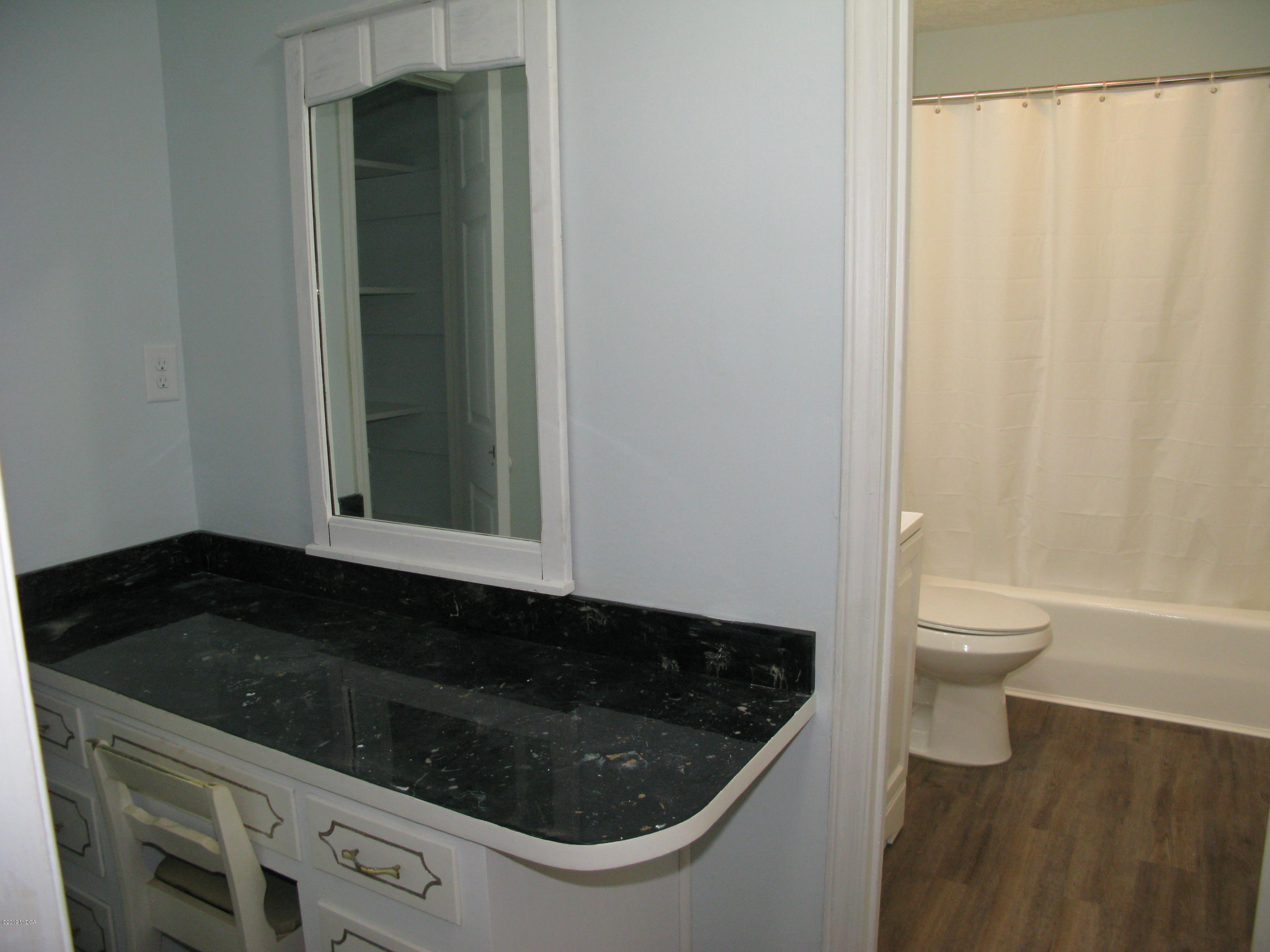 3812 Western Way Macon, GA 31216 - Photo 18 of 29 a bathroom with a sink and a toilet