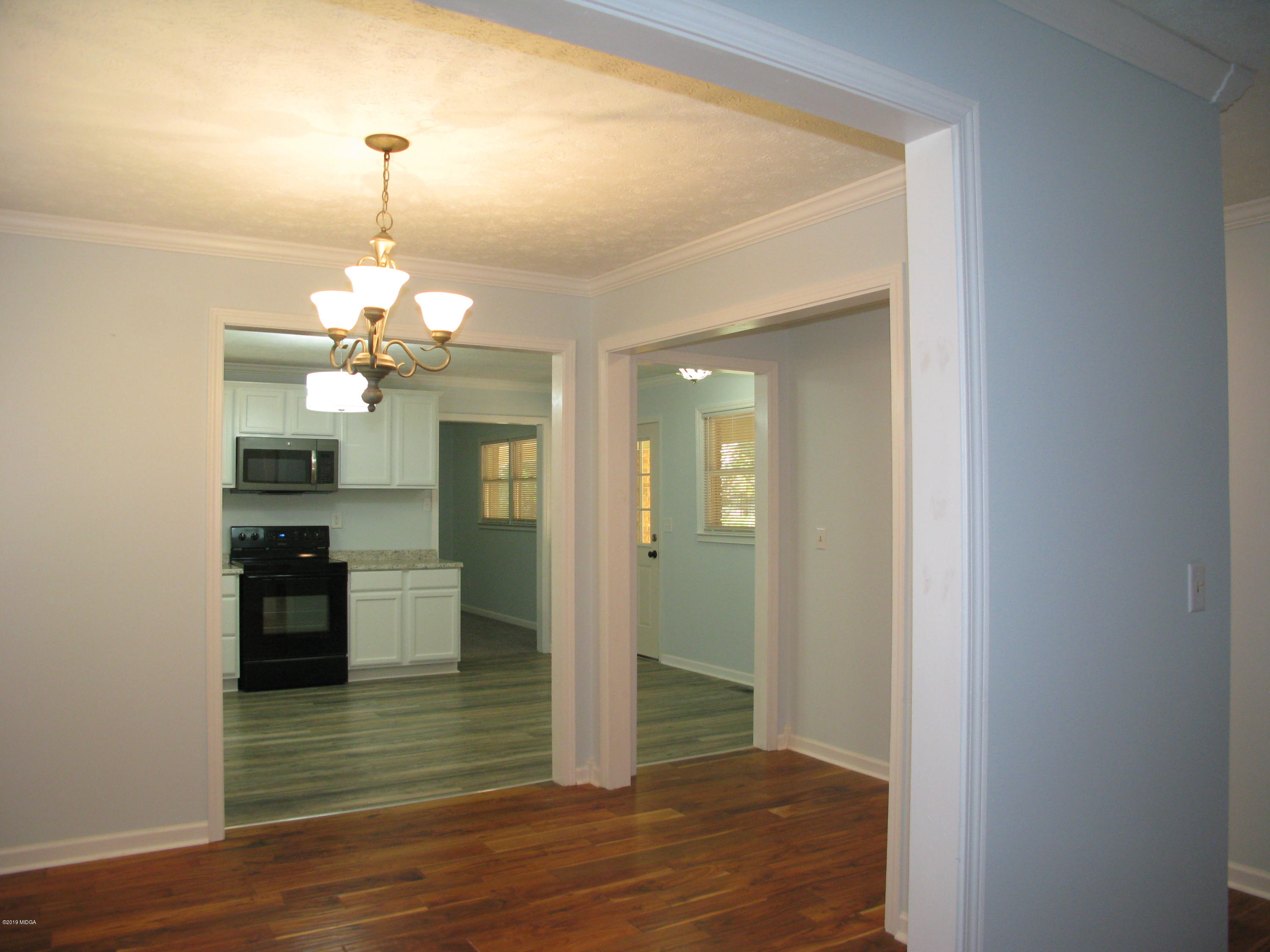 3812 Western Way Macon, GA 31216 - Photo 3 of 29 a view of a chandelier and wooden floor