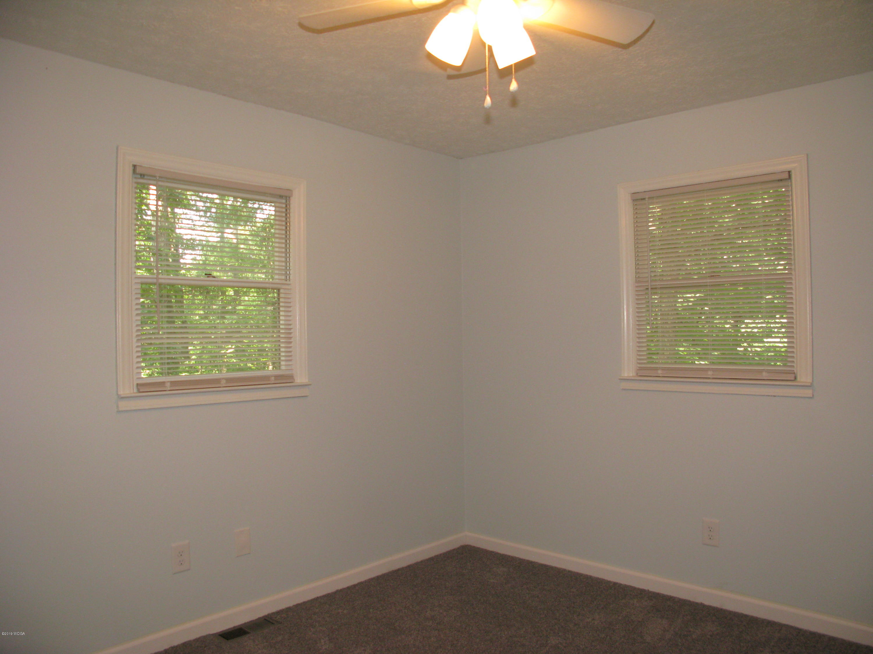 3812 Western Way Macon, GA 31216 - Photo 21 of 29 an empty room with a window