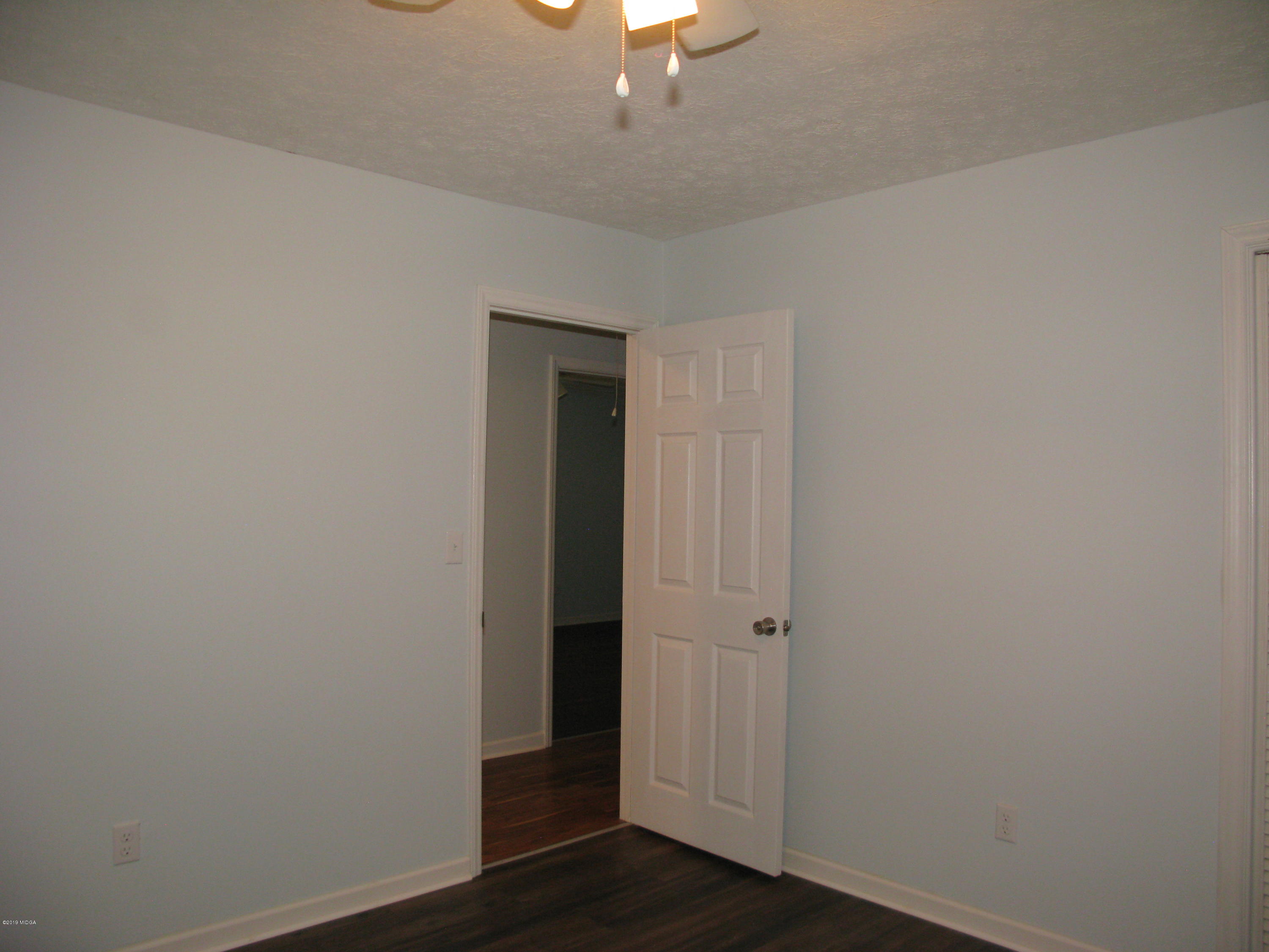 3812 Western Way Macon, GA 31216 - Photo 25 of 29 wooden floor in an empty room