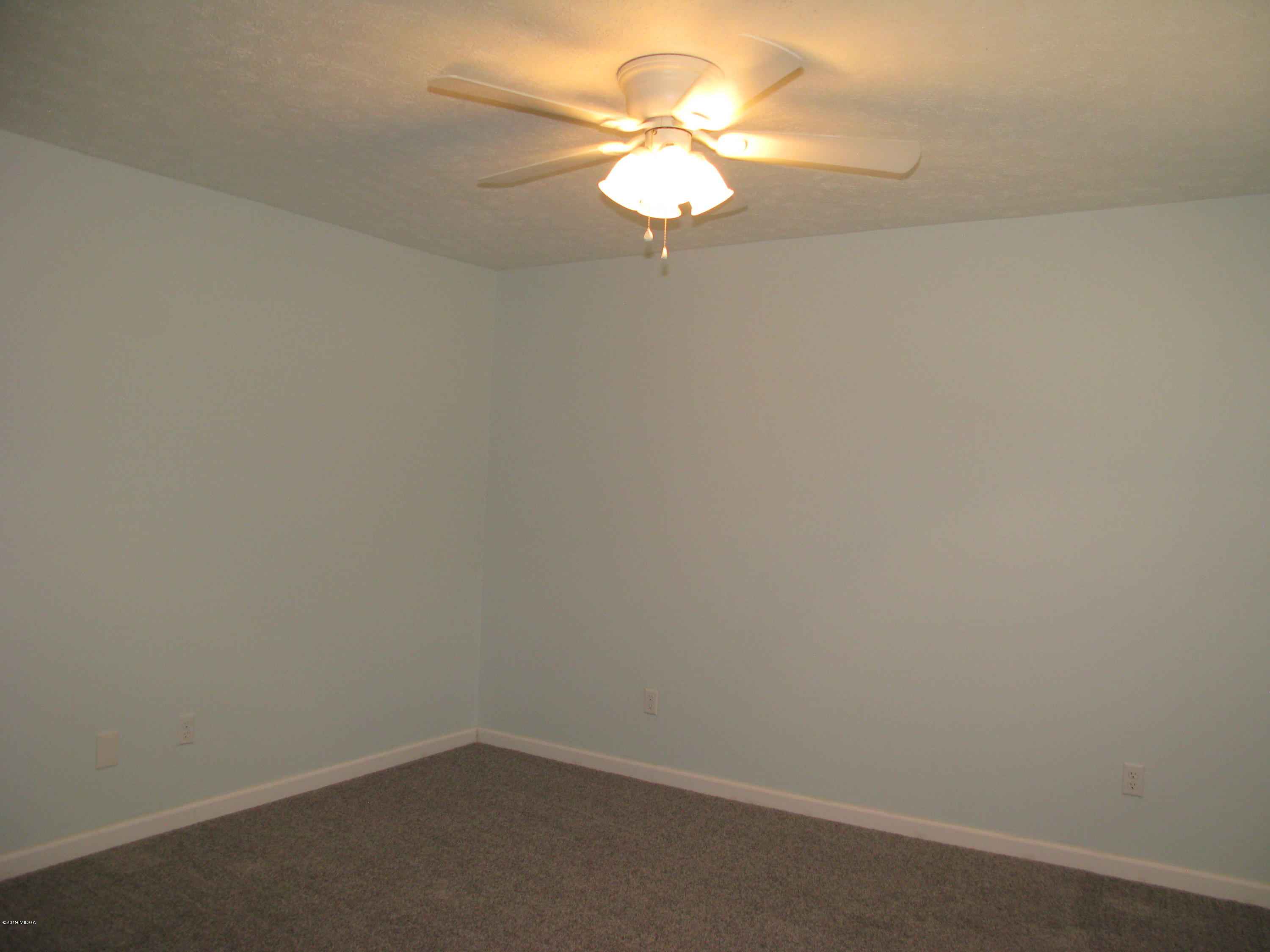 3812 Western Way Macon, GA 31216 - Photo 9 of 29 a small space with a chandelier fan