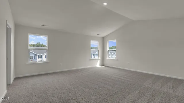 a bathroom with double sink and a mirror