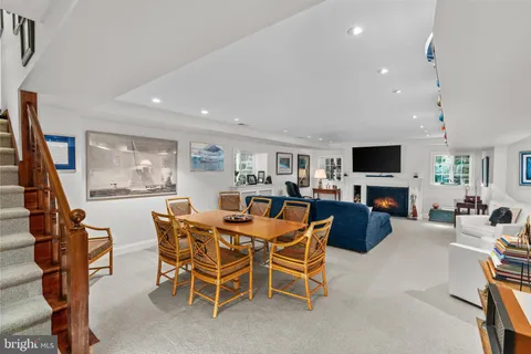 a view of a livingroom with furniture and a flat screen tv