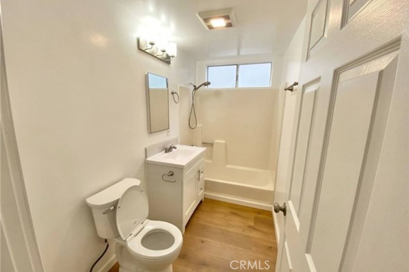 4237 Dixie Canyon Avenue, Unit 2 Sherman Oaks, CA 91423 - Photo 6 of 9 a bathroom with a sink toilet and shower