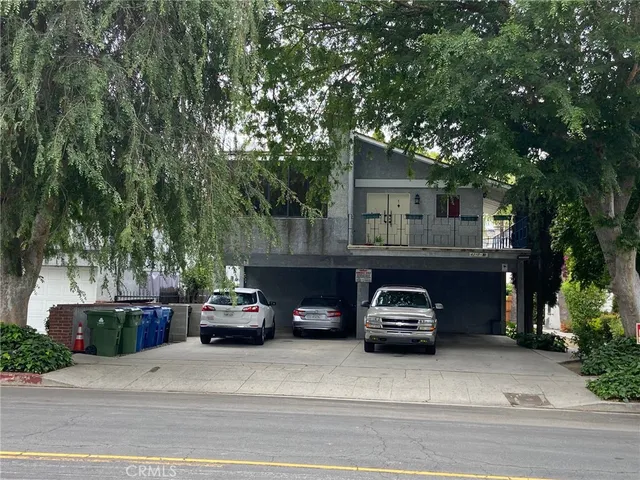 a car parked in front of a house