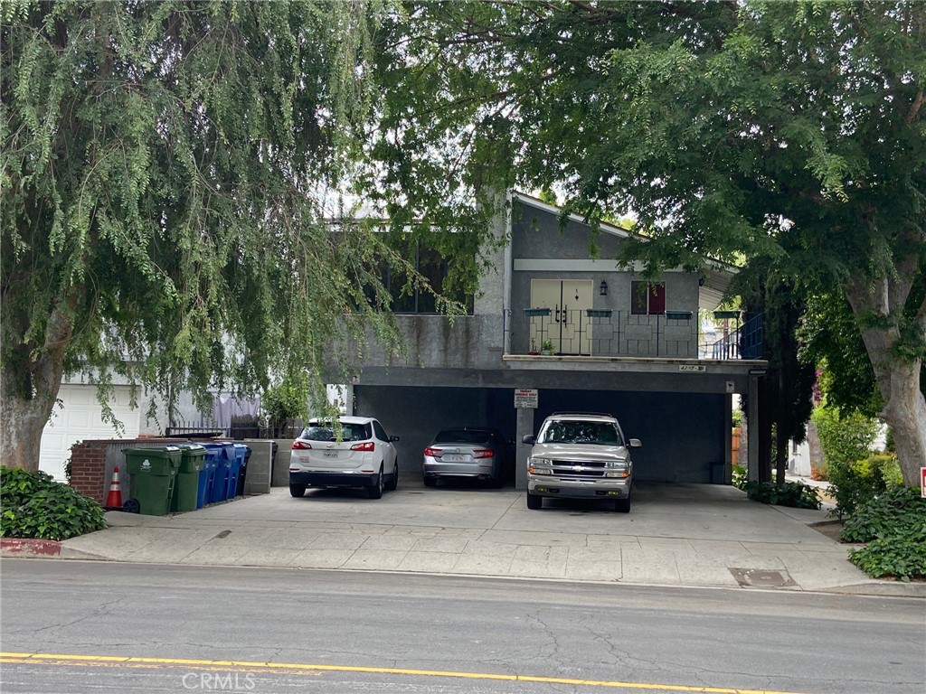 4237 Dixie Canyon Avenue, Unit 2 Sherman Oaks, CA 91423 - Photo 8 of 9 a car parked in front of a house