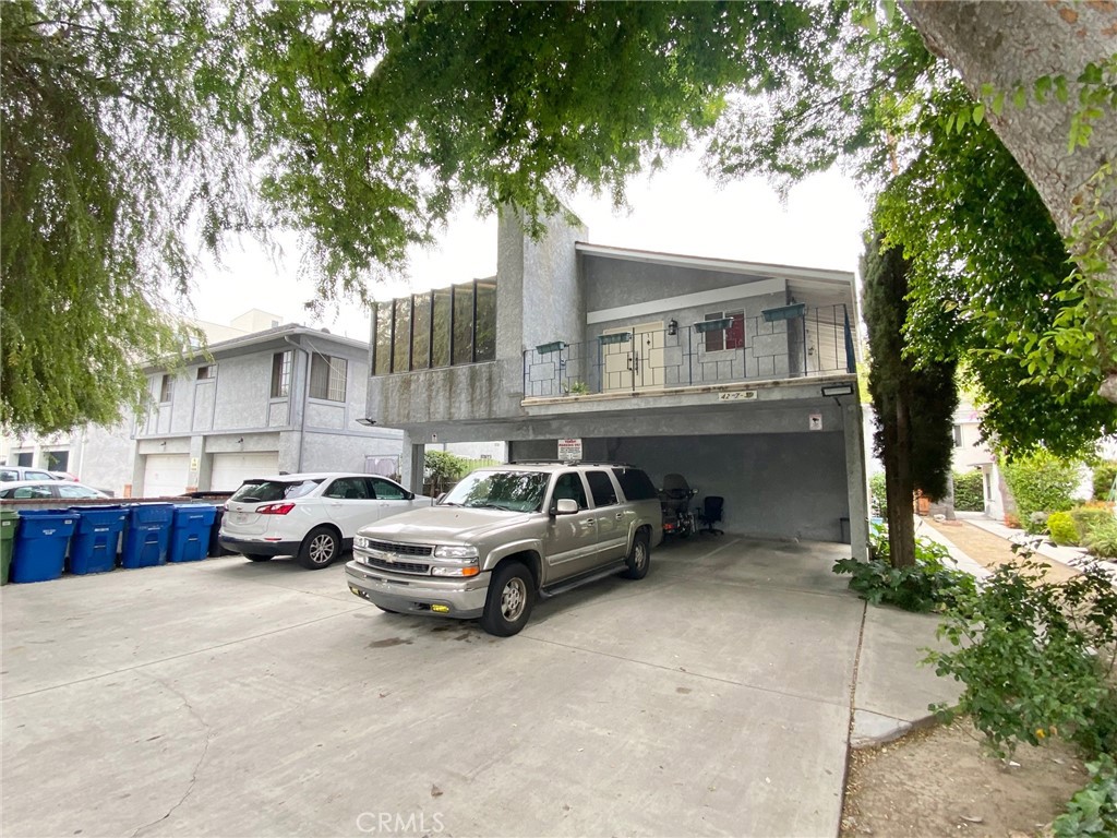 4237 Dixie Canyon Avenue, Unit 2 Sherman Oaks, CA 91423 - Photo 9 of 9 a view of street with parked cars