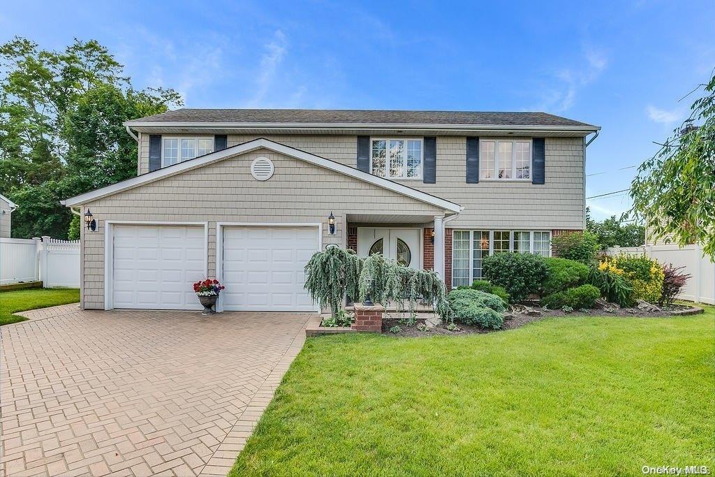 13 Jacob Road Plainview, NY 11803 - Photo 1 of 1 front view of a house with a yard