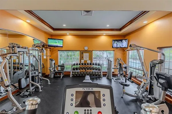 a green field with lots of trees