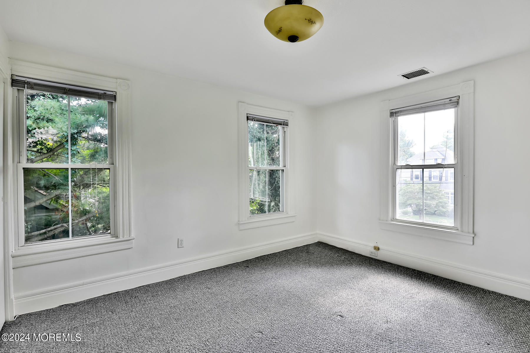 94 Branch Avenue Red Bank, NJ 07701 - Photo 14 of 21 an empty room with windows