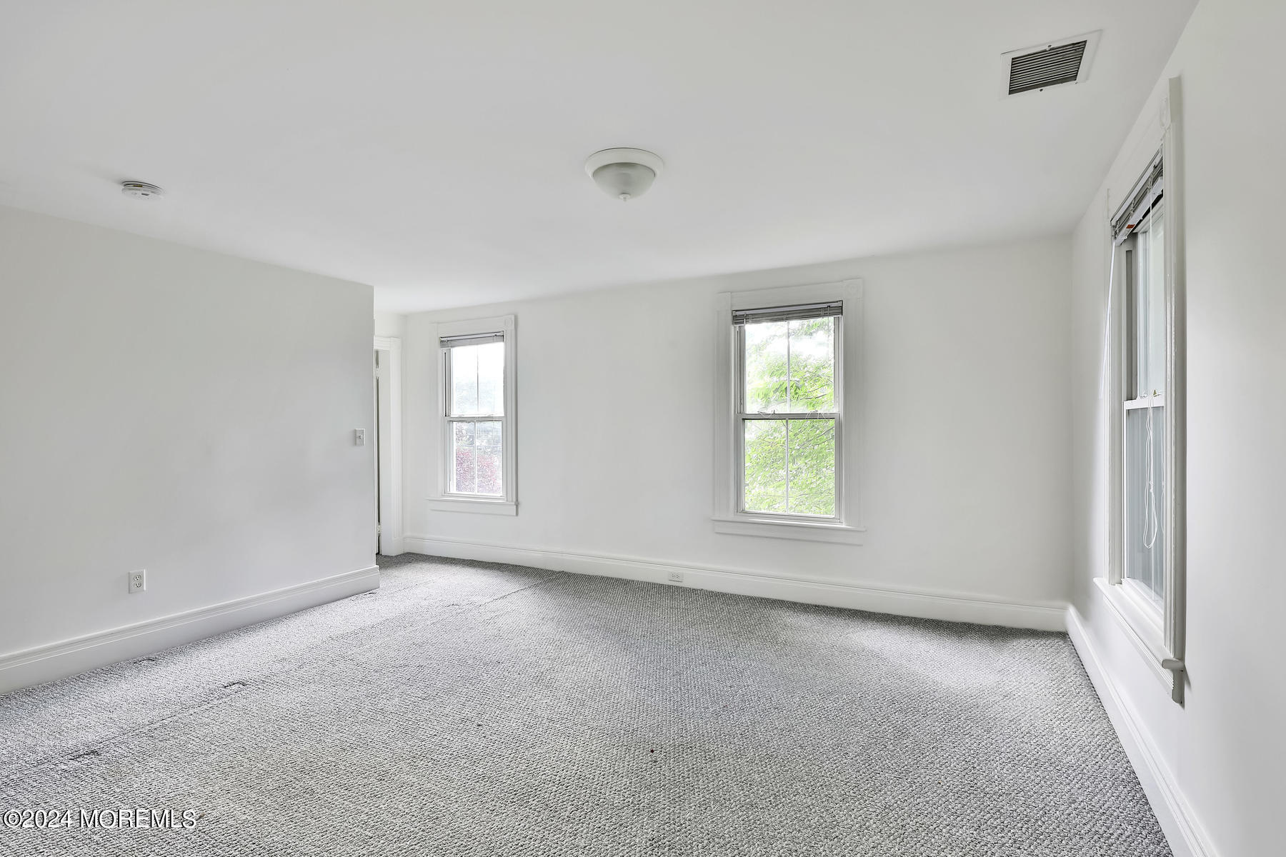 94 Branch Avenue Red Bank, NJ 07701 - Photo 18 of 21 a view of an empty room with a window