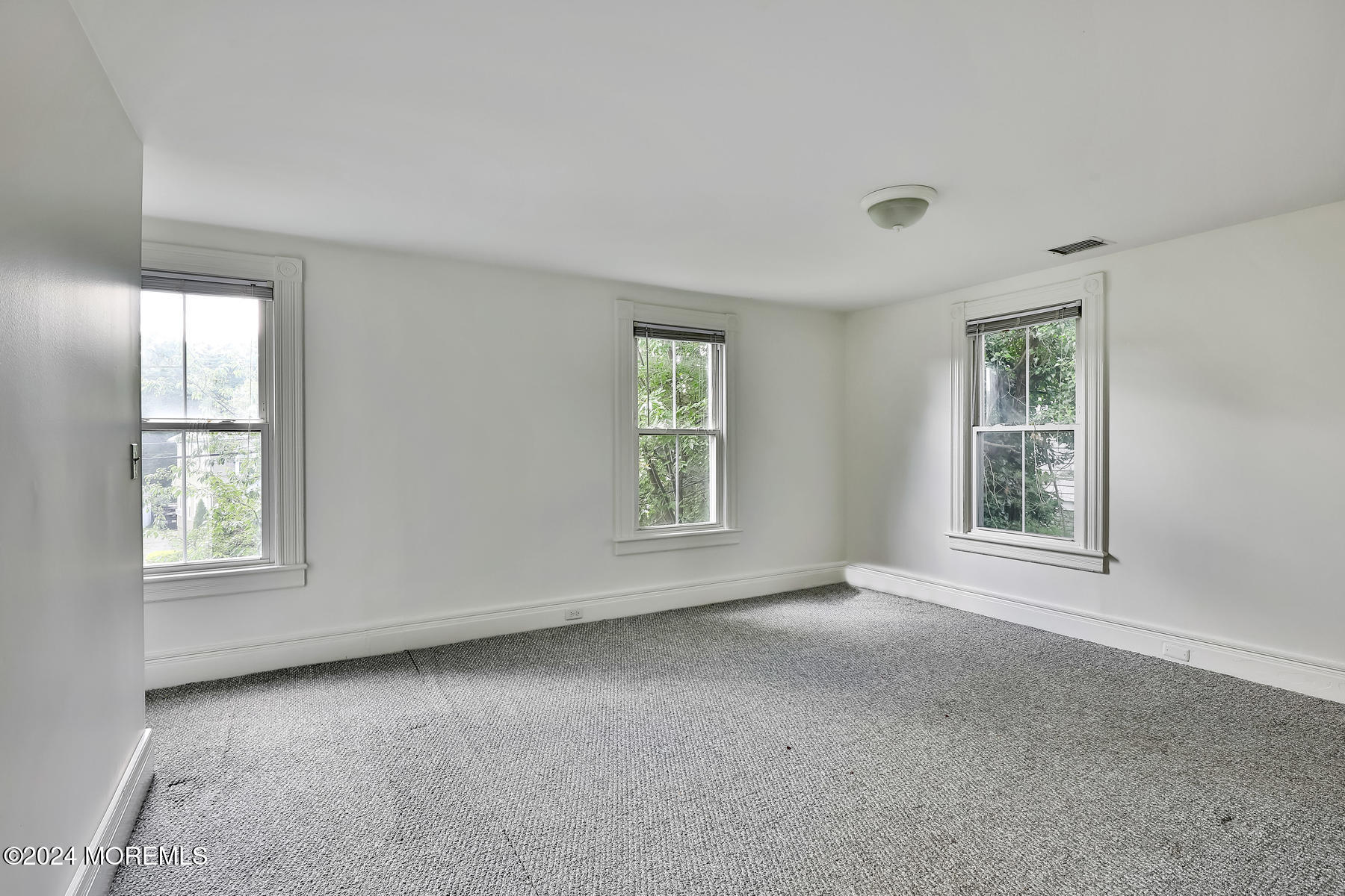 94 Branch Avenue Red Bank, NJ 07701 - Photo 19 of 21 a view of an empty room with a window