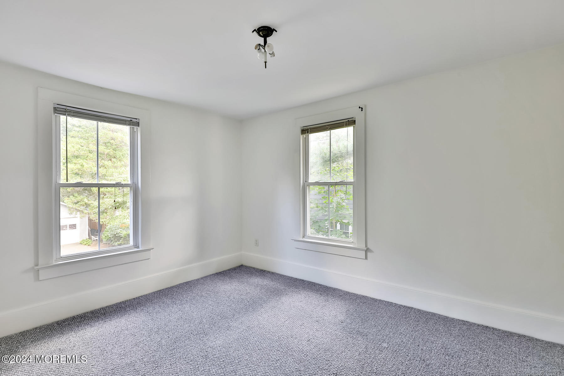 94 Branch Avenue Red Bank, NJ 07701 - Photo 20 of 21 an empty room with windows