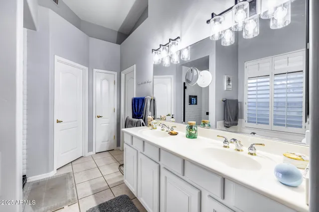 a room with furniture and two window