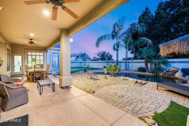 a view of swimming pool with seating space