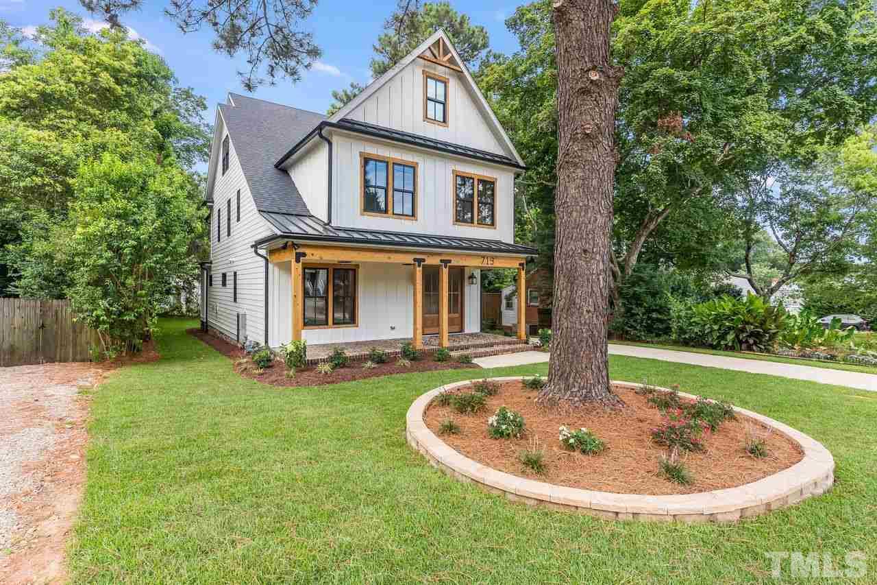 713 Mial Street Raleigh, NC 27608 - Photo 12 of 27 Access to Screened Porch, Both Fireplaces are gas
