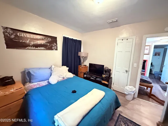 a view of a house with a yard and plants