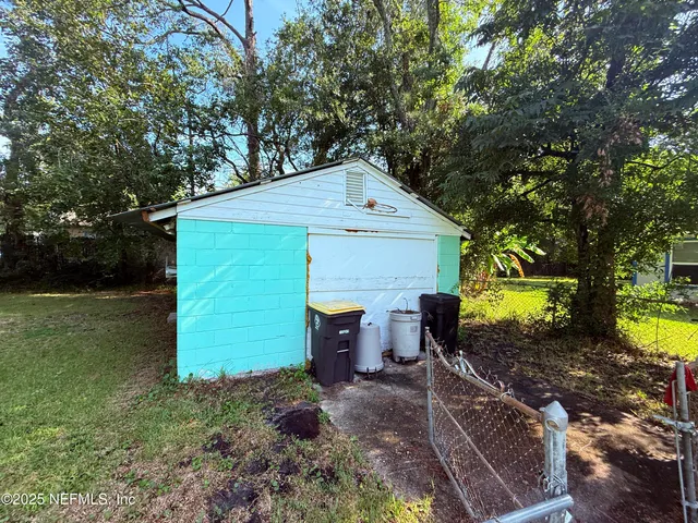 a view of a backyard with plants