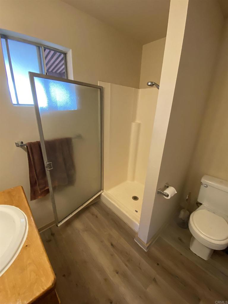2494 Donnil Lane Fallbrook, CA 92028 - Photo 16 of 62 a bathroom with a toilet and a shower