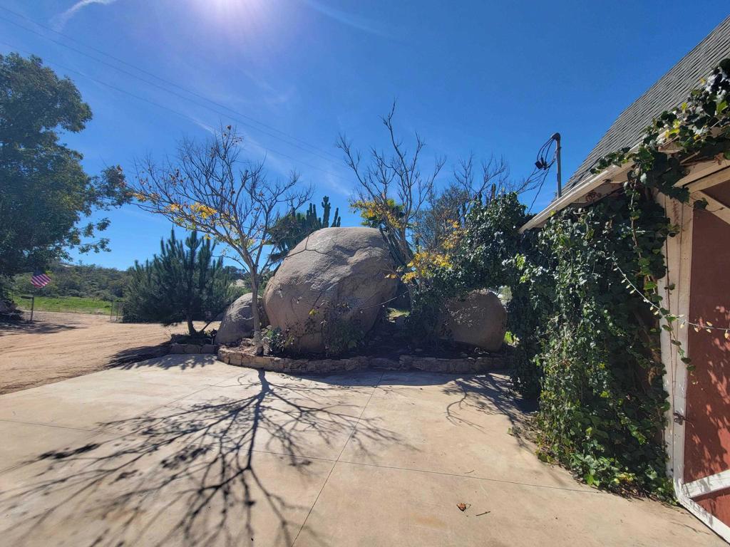 2494 Donnil Lane Fallbrook, CA 92028 - Photo 20 of 62 a view of a yard with a tree