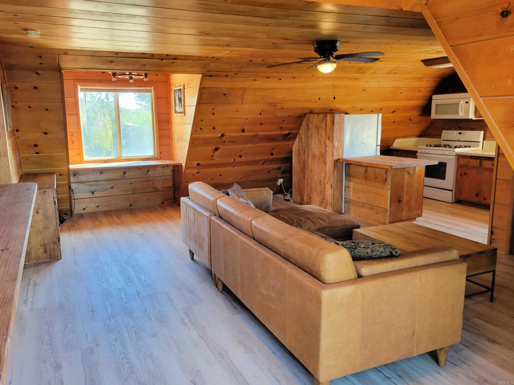 2494 Donnil Lane Fallbrook, CA 92028 - Photo 6 of 62 a living room with furniture and a fireplace