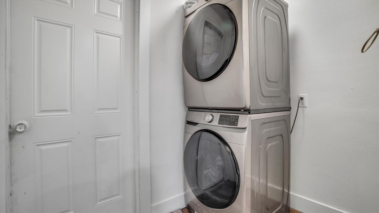2331 East Woodson Road Acampo, CA 95220 - Photo 13 of 59 a close view of a utility room with dryer and washer