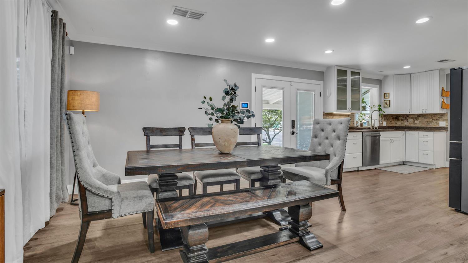2331 East Woodson Road Acampo, CA 95220 - Photo 14 of 59 a view of a dining room with furniture
