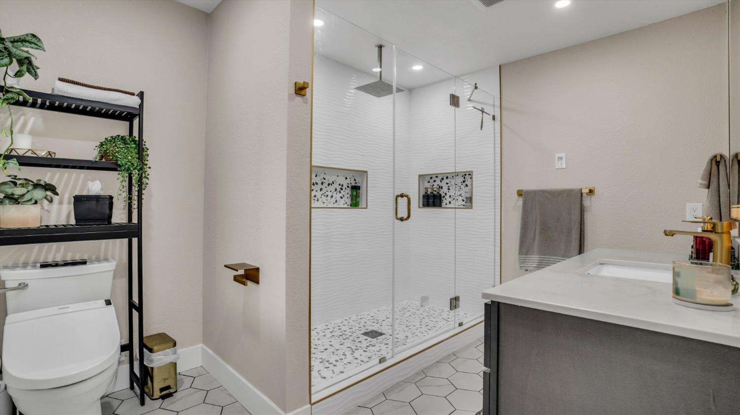 2331 East Woodson Road Acampo, CA 95220 - Photo 24 of 59 a bathroom with a shower sink mirror and toilet